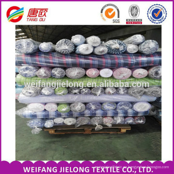 En existencias fabric100% hilados de algodón teñido de cuadros de tela textil para hombres de la camisa de las mujeres vestido de tela a cuadros teñido de telas en Shandong